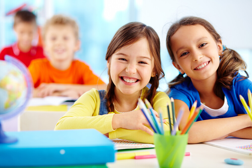 Young girl students in school